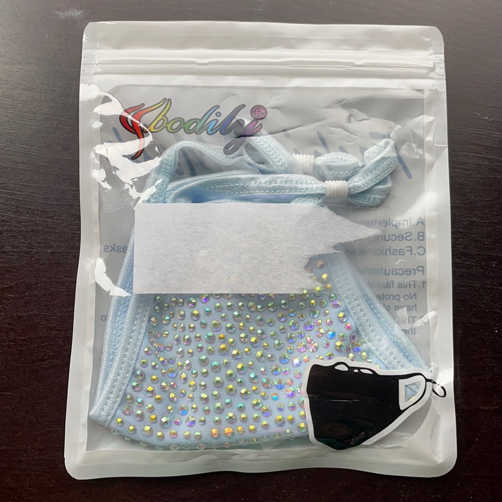 Face mask baby blue with rhinestones adjustable straps never opened
